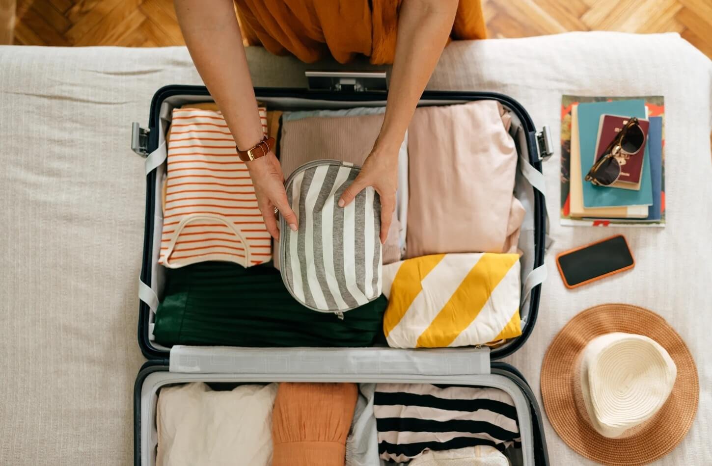 What to Pack for Nile Cruise Egypt: Ultimate Guide 1 A picture containing a bag with clothes inside everything you need on Nile Cruise