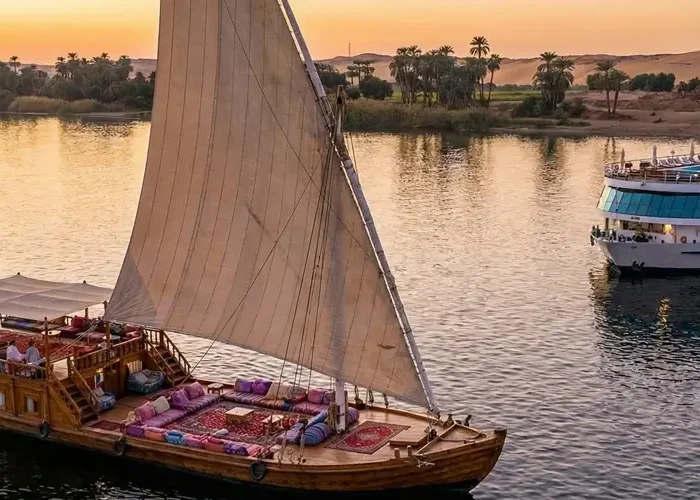 Comparison of Dahabiya and Nile Cruise Ships on the Nile River.