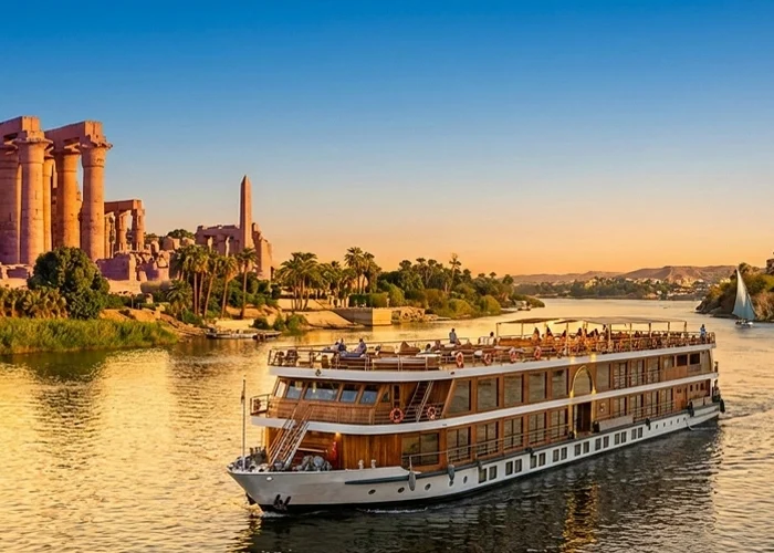 Stunning view of Luxor, Aswan, and a Nile cruise showcasing ancient Egyptian architecture and landscapes.