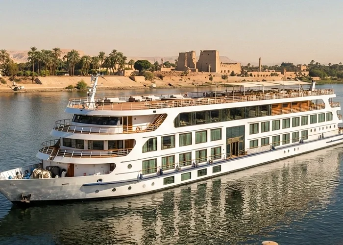 Cruise ship sailing on the Nile River during sunset