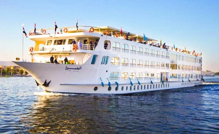 A scenic view of the Al-Hambra during a cruise, showcasing its stunning architecture and surroundings.