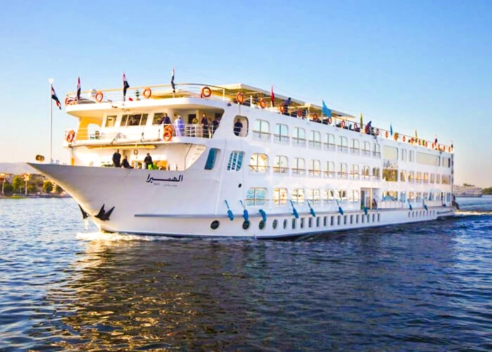 A scenic view of the Al-Hambra during a cruise, showcasing its stunning architecture and surroundings.