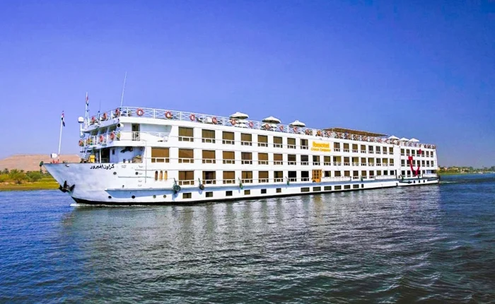 Iberotel Crown Emperor Cruise ship docked at sunset