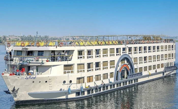 Luxury cruise boat on the Nile River with scenic views