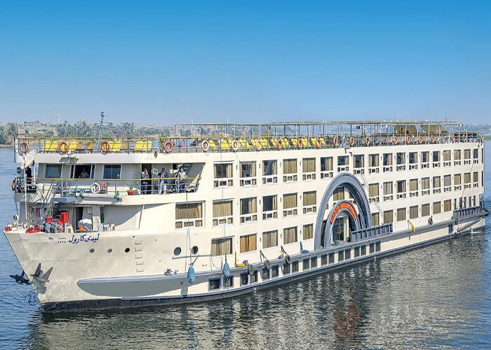 Luxury cruise boat on the Nile River with scenic views