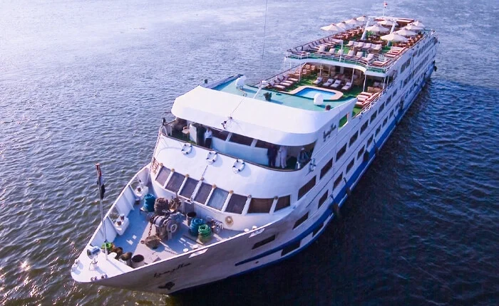 Luxury cruise ship MS Salacia navigating calm waters.