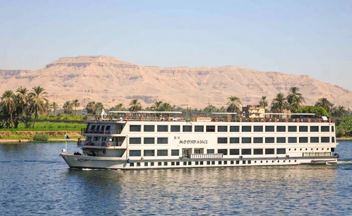 A scenic view of the Moon Dance cruise in the evening sky.