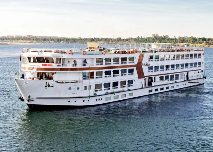 Luxurious Nile cruise boat sailing on the river with stunning views.