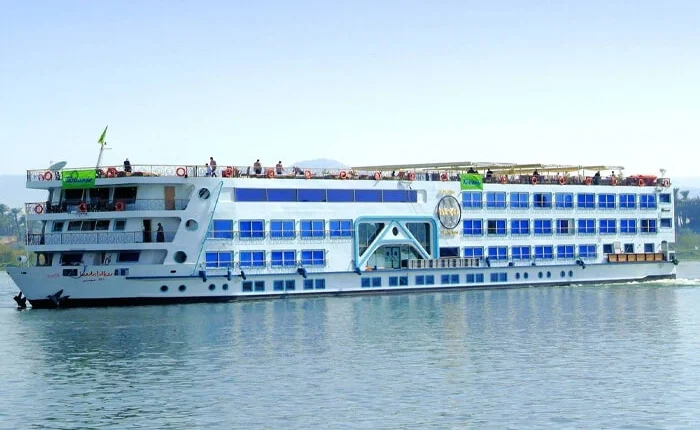 Luxury cruise ship navigating the Nile River in Egypt.