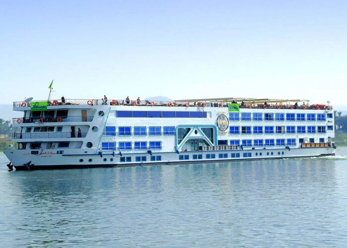 Luxury cruise ship navigating the Nile River in Egypt.
