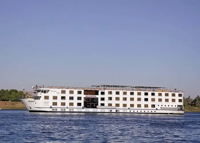 Luxurious Royal Lily cruise ship sailing on calm waters.