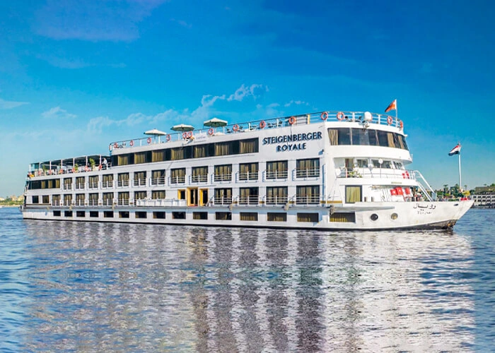 Luxurious Steigenberger Royale cruise ship docked at sunset