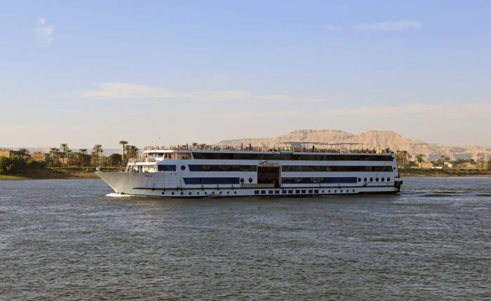 Scenic view of the Blue Shadow Nile cruise with lush landscapes and clear skies.