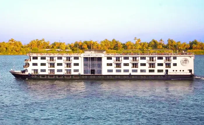 A breathtaking view of the Star Goddess cruise ship on the water at sunset.