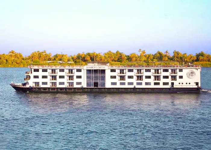 A breathtaking view of the Star Goddess cruise ship on the water at sunset.