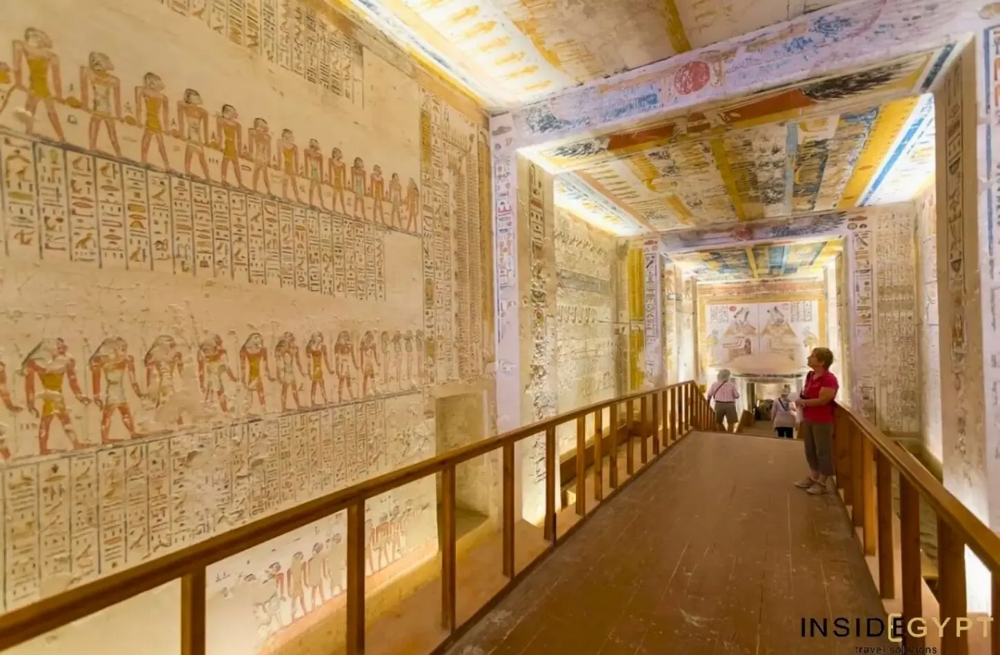 A vibrant interior view of an ancient Egyptian tomb in the valley of the kings egypt, likely the Tomb of Ramesses VI