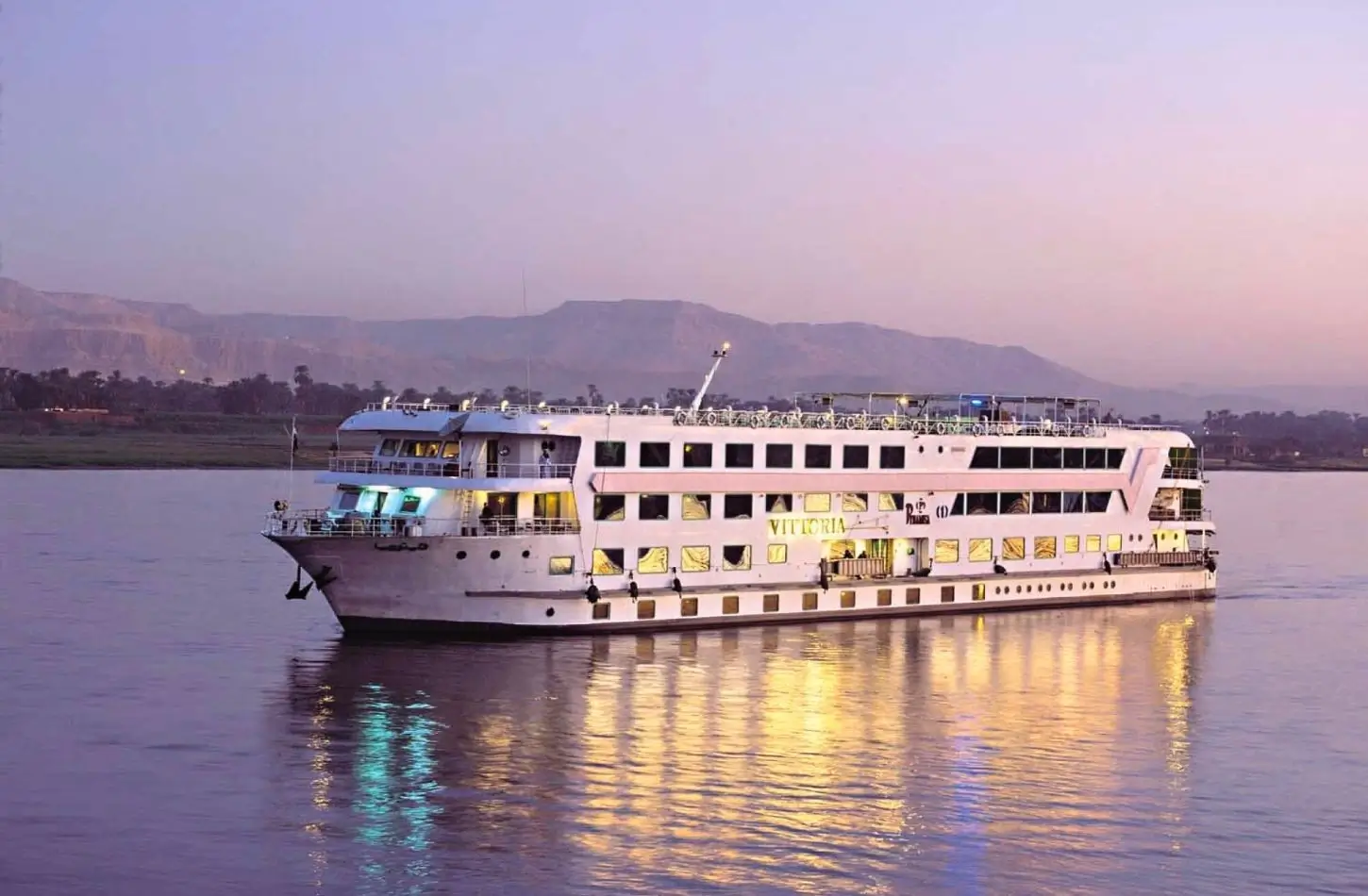 Is Nile Cruise Worth It? Best 2026 Guide 2 luxury river cruise evening lights nile river