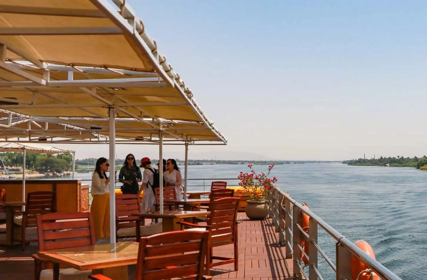 Is Nile Cruise Worth It? Best 2026 Guide 1 outdoor seating area on nile cruise ship overlooking river